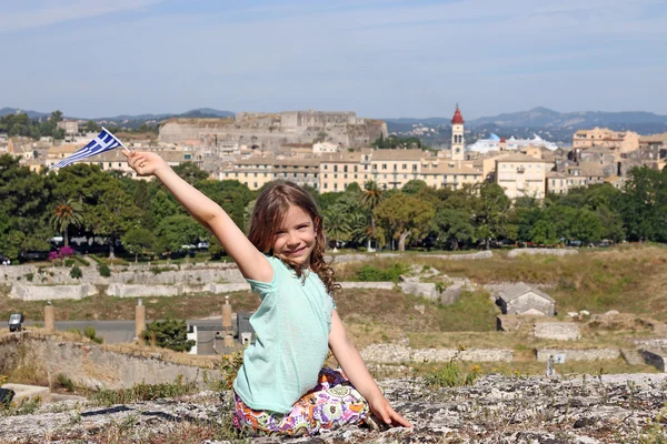 Little girl with Greek flag Corfu town Greece — Stock Photo, Image