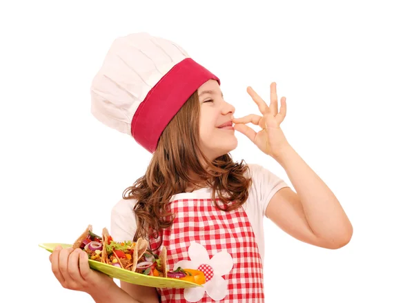 Happy little girl cook with tacos and ok hand sign — Stock Photo, Image