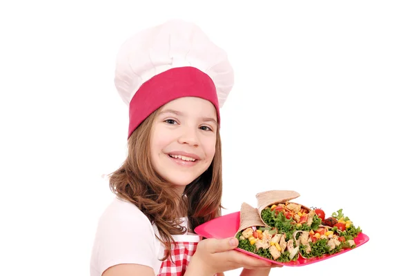 Petite fille cuisinier avec burritos fast food — Photo