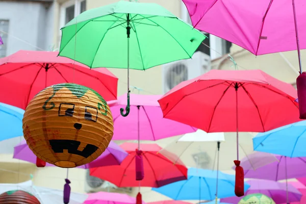 Halloween lampion and umbrellas — Stock Photo, Image
