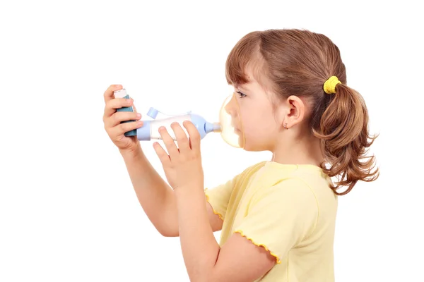 Little girl with asthma inhaler — Stock Photo, Image