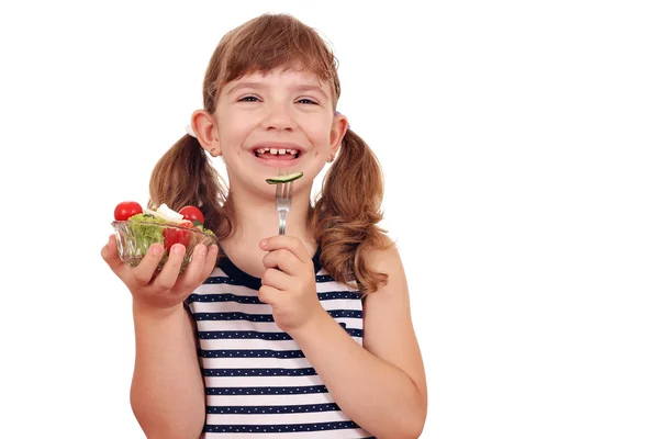 Niña feliz comiendo ensalada —  Fotos de Stock