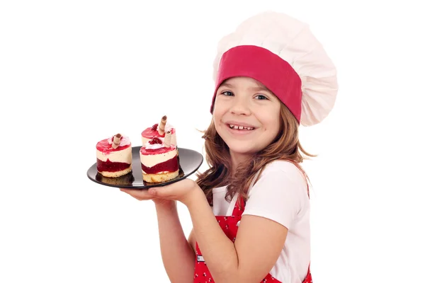 Little girl cook with sweet raspberry cake — Stock Photo, Image