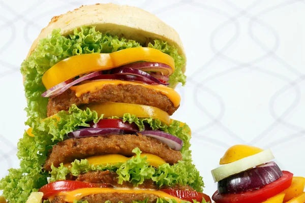 Gros hamburger gros plan fond alimentaire — Photo