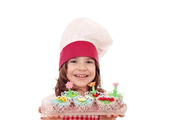 Niña feliz con pasteles de flores de primavera —  Fotos de Stock