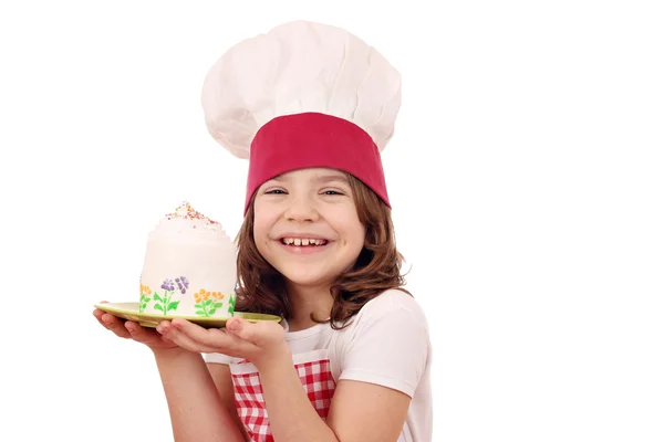 Happy little girl cook with sweet cupcake — Stock Photo, Image