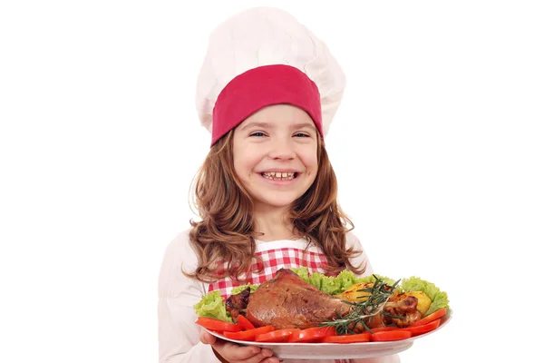 Happy little girl cook with big turkey drumstick — Stock Photo, Image