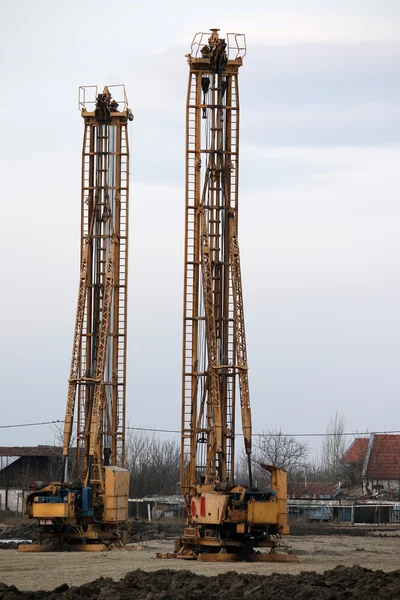 Construction site with hydraulic drilling machines — Stock Photo, Image