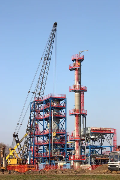 New refinery construction site with machinery — Stock Photo, Image