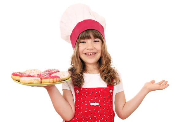 小女孩甜甜甜圈与厨师 — 图库照片