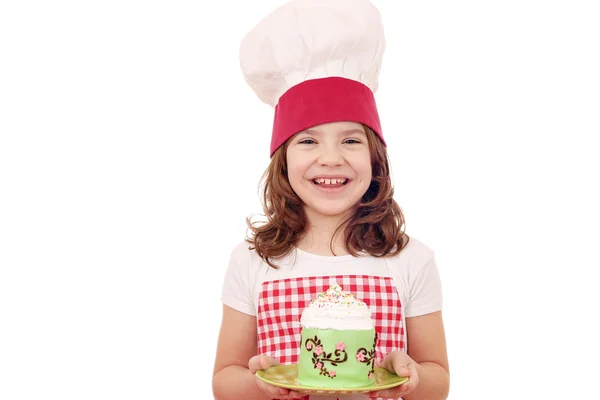 Happy little girl cook with cake — Stock Photo, Image