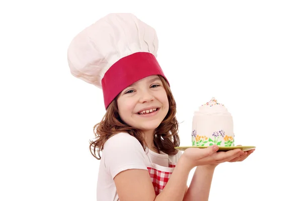 Feliz niña cocinera con retrato de pastel — Foto de Stock