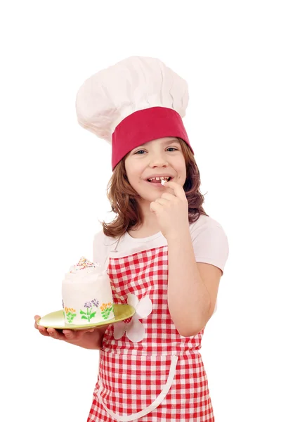 Menina feliz cozinhar com bolo — Fotografia de Stock