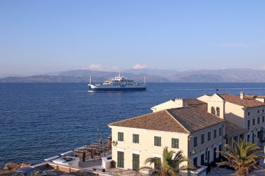 ferry boat sailing near old Corfu town Greece