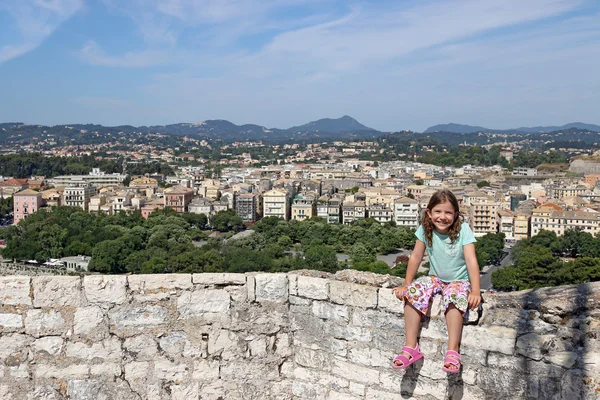 Happy little girl on vacation in Corfu town Greece — Stock Photo, Image