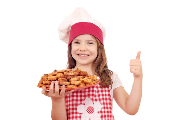 Felice bambina cuoco tenere con bruschetta e pollice in su — Foto Stock