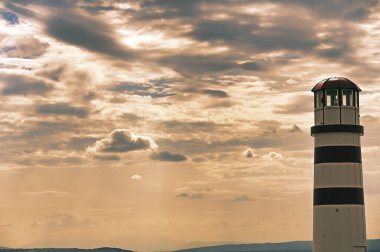 Lighthouse and sunset sky, Podersdorf am See, Austria