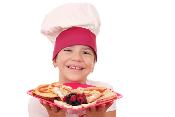 Feliz niña cocinero con crepes retrato — Foto de Stock