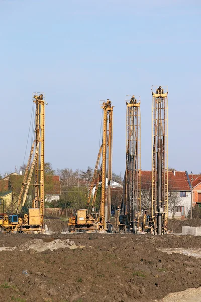 Hydrauliska borrning maskiner på byggarbetsplatsen — Stockfoto