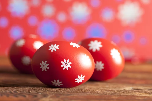 Pasen eieren op patroon achtergrond — Stockfoto