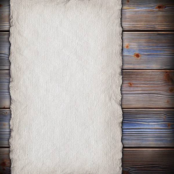 Handgeschept papier blad op oude houten plank muur achtergrond — Stockfoto