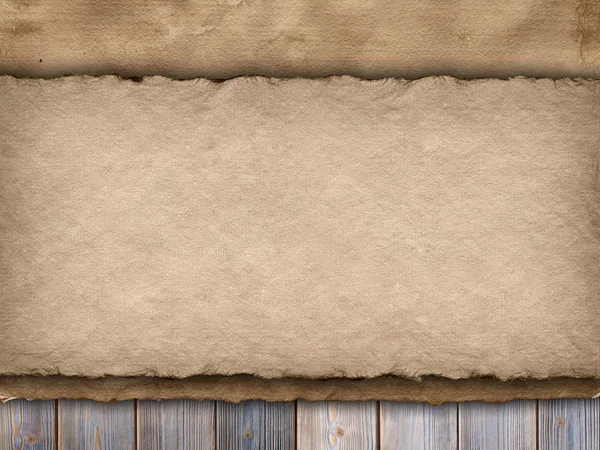 Two sheets of handmade paper on wooden wall background — Stock Photo, Image