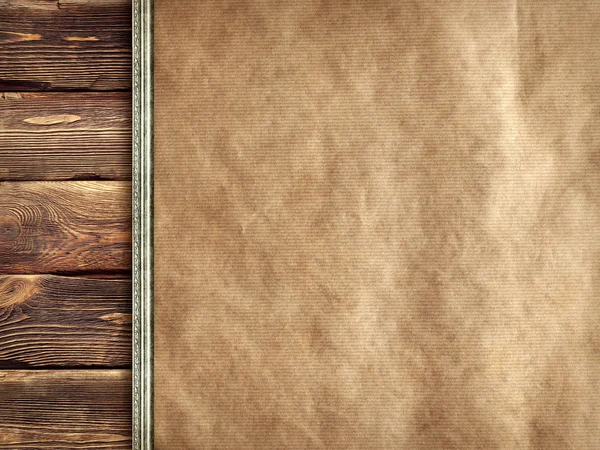 木製の壁の背景にしわの手漉き紙 — ストック写真