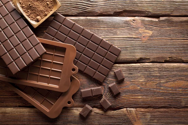 巧克力对木墙背景 — 图库照片