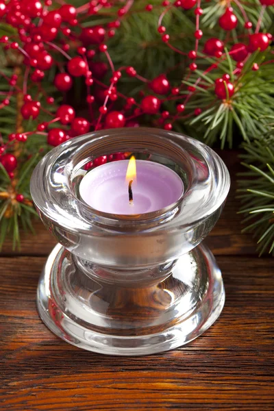 Christmas candle and branch of spruce tree — Stock Photo, Image