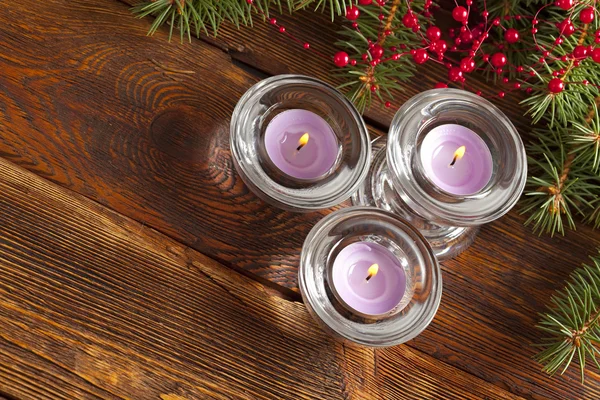 Christmas background - candles and spruce tree — Stock Photo, Image