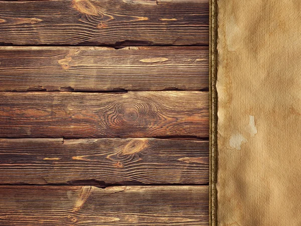 Creased handmade paper on wooden wall background — Stock Photo, Image