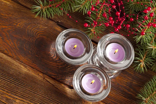 Christmas background - candles and spruce tree — Stock Photo, Image