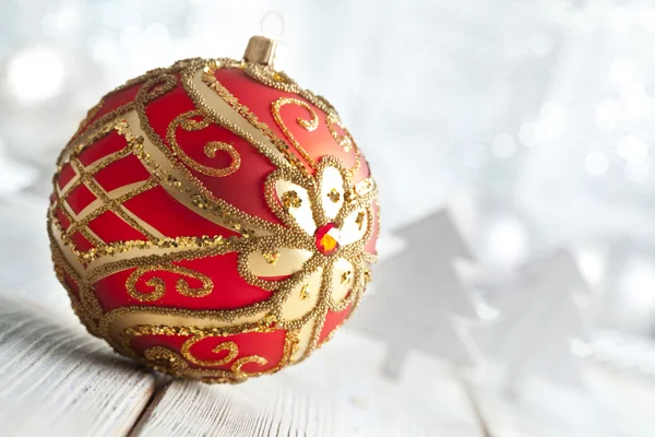 Red Christmas bauble on white background — Stok fotoğraf