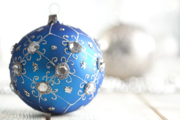 Christmas bauble on silver background Stock Picture