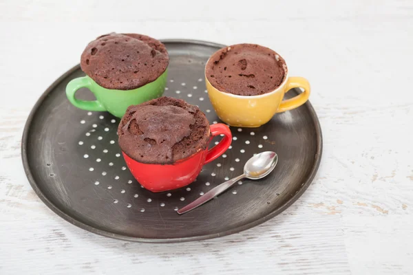 Warm chocolate cake in a mug — Stock Photo, Image