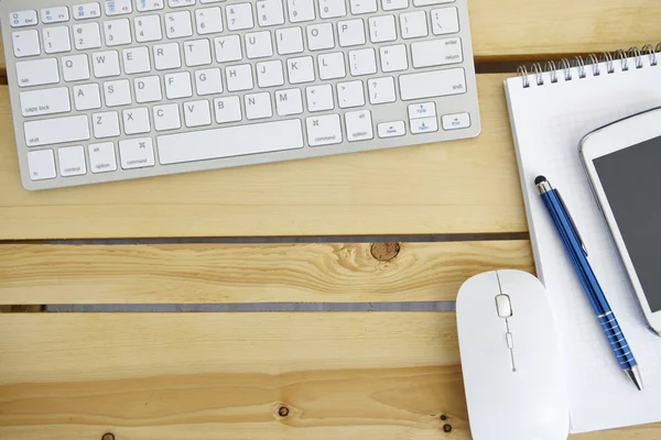 Office desk table with computer, mouse and supplies — Stock Photo, Image