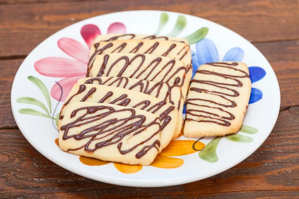 Süße Butterkekse mit Schokoladenbelag — Stockfoto