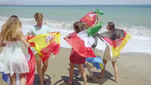 People having fun with flags of countries — Stock Video