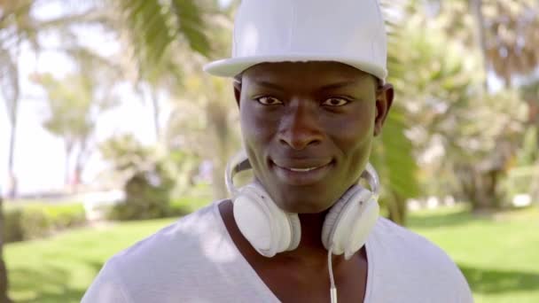 Handsome young man in baseball cap — Stock Video