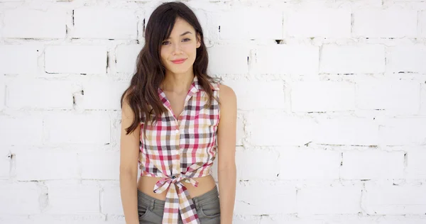 Attractive woman with checkered top and shorts — Stock Photo, Image