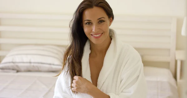 Young woman in white bath robe — Stock Photo, Image