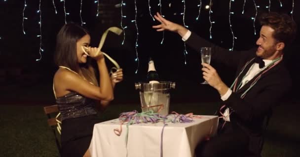 Woman teases her dinner date with ribbon — Stok video