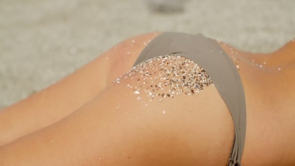 Woman with Sand on Buttocks — Stock Video