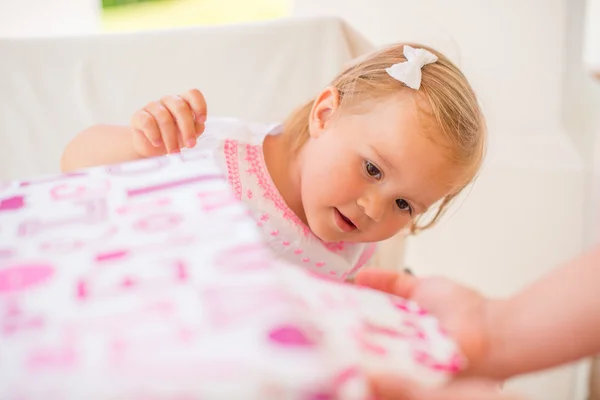 Excited Cutie Unwrapping Birthday Present — Stock Photo, Image