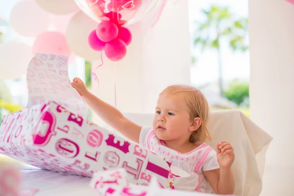 Excited Cutie Unwrapping Birthday Present — Stock Photo, Image