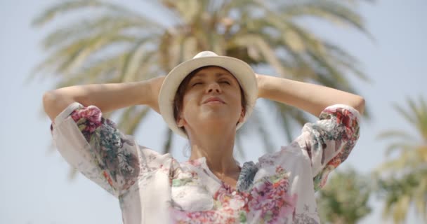 Relaxed Woman with Eyes Closed on Palm Tree Beach — Stock Video