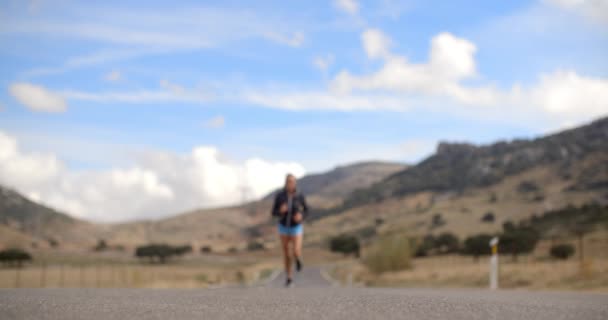 Fitress Girl Running on the Road in Mountains — Stock Video