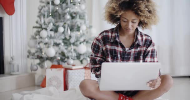 Young African student working on her laptop — Stok video