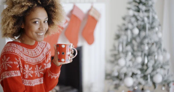 Woman drinking mug of Christmas coffee — Zdjęcie stockowe