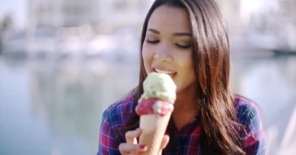 Girl eating delicious ice cream — Stock Video